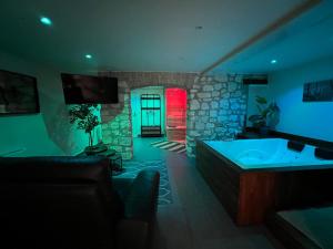 Appartements Appart Spa Privatif : photos des chambres