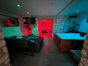 Appartements Appart Spa Privatif : photos des chambres