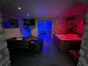 Appartements Appart Spa Privatif : photos des chambres