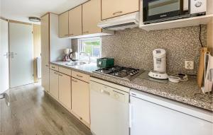 Lovely Stacaravan In Tzummarum