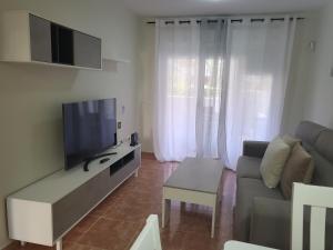 Bajo precioso en primera línea de Vera-Playa con piscina privada y terraza!