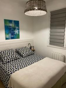 Appartements Les Lilas : photos des chambres