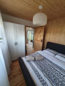 Domki letniskowe Leśne Spa Borsk nad Jeziorem Wdzydzkim BASEN SAUNA BALIA