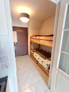 Appartements Notre petit coin de montagne cosy a 1400m ! : photos des chambres