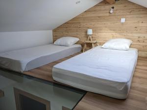 Appartements Appartemment type chalet : photos des chambres