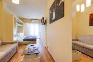 Queen Room with Balcony room in Home Boutique Santa Maria Novella