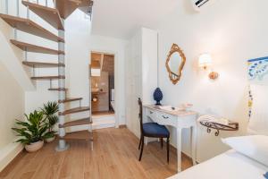 Ottaviano Suite - Elegante attico vista Mare