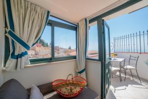 Ottaviano Suite - Elegante attico vista Mare