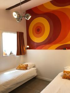 B&B / Chambres d'hotes Chambres d'Hotes L'Ostal de Pombonne : Appartement - Vue sur Jardin