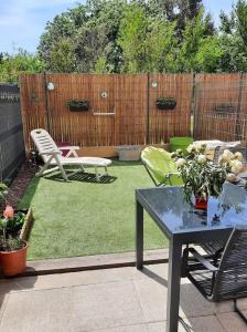 Maisons de vacances Maison avec jardin : photos des chambres