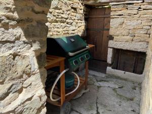Maisons de vacances Petite maison chaleureuse avec jacuzzi privatif : photos des chambres
