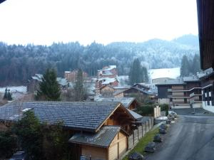 Grand studio familial au pied des pistes avec balcon - FR-1-573-64