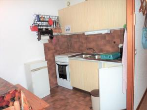 Grand studio familial au pied des pistes avec balcon - FR-1-573-64