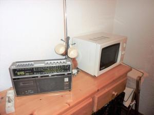 Grand studio familial au pied des pistes avec balcon - FR-1-573-64