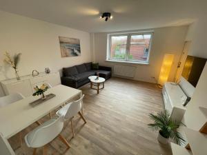 FEDDERSEN LIVING Kernsanierte Ferienwohnungen - Gemütlich - Netflix - Voll ausgestattet - zentral