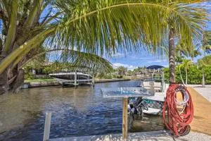 Palm City Canalfront Home with Boat Dock and Fire Pit! - Lighthouse Point