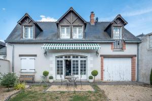 Maisons de vacances L'HIRONDELLE - Maison au coeur des Chateaux : photos des chambres