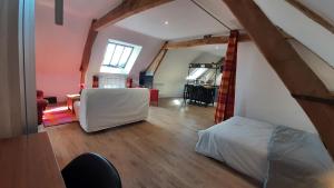 Appartements Les petits greniers : photos des chambres