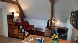 Appartements Les petits greniers : photos des chambres