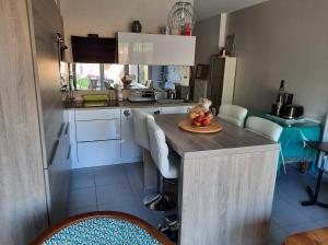 Maisons de vacances Maison avec jardin : photos des chambres