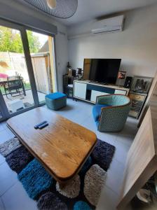 Maisons de vacances Maison avec jardin : photos des chambres