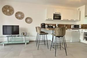 Appartements T2 neuf avec belle terrasse proche plage : photos des chambres