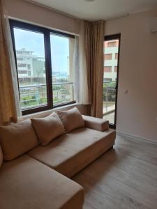 Modern 1BR Apartment with Sea View & Pool Included with Parking Space