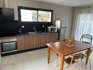 Maisons de vacances Appartement neuf et moderne au coeur de la Camargue : photos des chambres