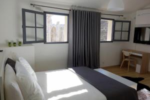 Appartements Arles Hideaway - Le Duplex des Arenes : photos des chambres