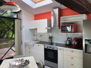 B&B / Chambres d'hotes Chambres d'Hotes L'Ostal de Pombonne : photos des chambres