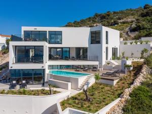 Luxury Seafront Villa Roots with private, heated pool, 5 en-suite bedrooms, enchanting sea views