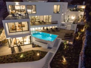 Luxury Seafront Villa Roots with private, heated pool, 5 en-suite bedrooms, enchanting sea views