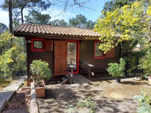 Chalets Chalet dans la pinede entre lac et ocean : photos des chambres