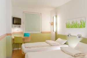 Hotels ibis Budget Arles Palais Des Congres : photos des chambres