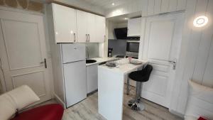 Appartements Le Petit Paradis : photos des chambres