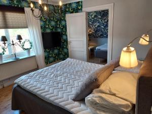 Quadruple Room with Shared Bathroom room in Älgbergets Bed & Breakfast