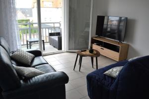 Appartements Appartement spacieux avec balcon - a 50m de la plage : photos des chambres