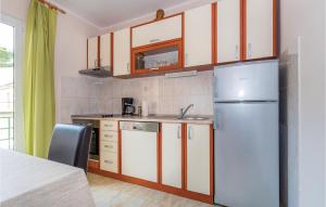 Nice Apartment In Raslina With 2 Bedrooms And Wifi