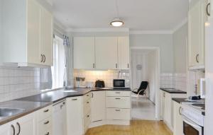 Nice Home In Tomelilla With Kitchen