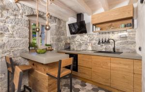 Amazing Home In Mucici With Kitchen