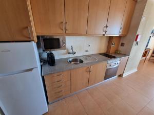 Apartamento junto a Praia com piscina.