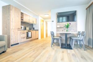 Lauberhorn Apartment - Aare Jungfrau AG