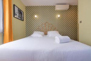 Hotels Hotel Cosmopolitain : photos des chambres
