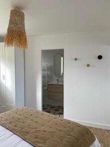 Appartements Casa Nomad - appartement cozy les pieds dans l'eau : photos des chambres