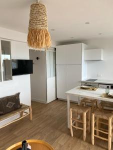 Appartements Casa Nomad - appartement cozy les pieds dans l'eau : photos des chambres