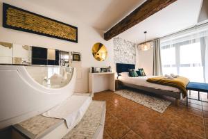 Appartements Les Precieuses Suites & Spa I : photos des chambres