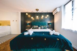 Appartements Les Precieuses Suites & Spa I : photos des chambres