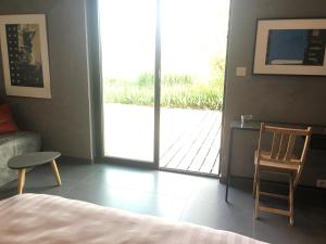 B&B / Chambres d'hotes Belle chambre avec vue dans maison d'architecte : photos des chambres