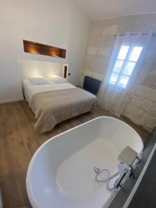 Appartements App design au centre des remparts d’Aigues-Mortes. : photos des chambres