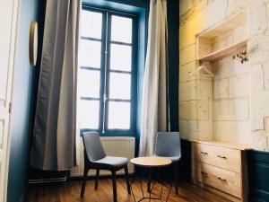 Appartements Meubles de l'Arsenal coeur de ville ! : photos des chambres